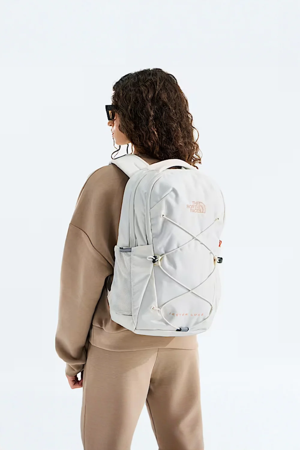 The North Face Jester Luxe Backpack for Women in White Dune/Burnt Coral Metallic | NF0A81E6-G2I - Image 3